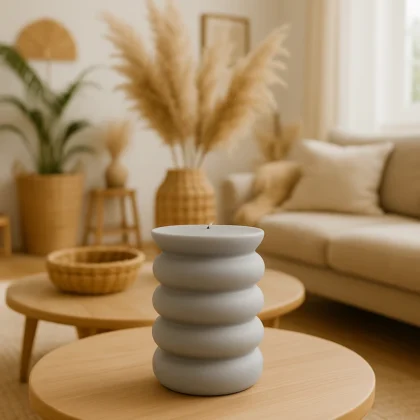 A modern ribbed pillar candle