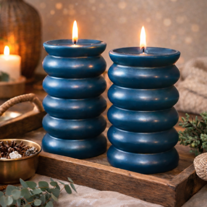 Set of two unscented ribbed pillar candles in teal on a wooden tray, decorative Home and Garden candle styling