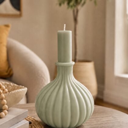 Sage green 7-inch pillar candle Decorative sage green pillar candle styled in neutral home decor Minimalist green candle for shelf styling Tall sage green candle for tabletop decor Serene pillar candle for calming home interiors