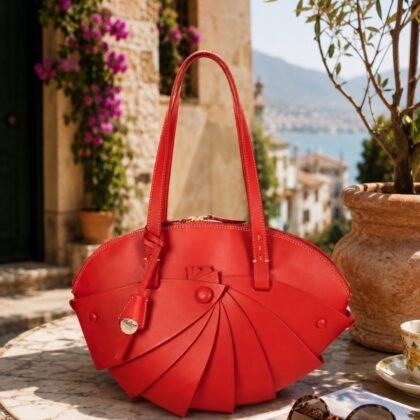 Red Boldrini Selleria Tosca Italian calfskin leather shoulder bag with sculptural fan-inspired front detail and light gold hardware.