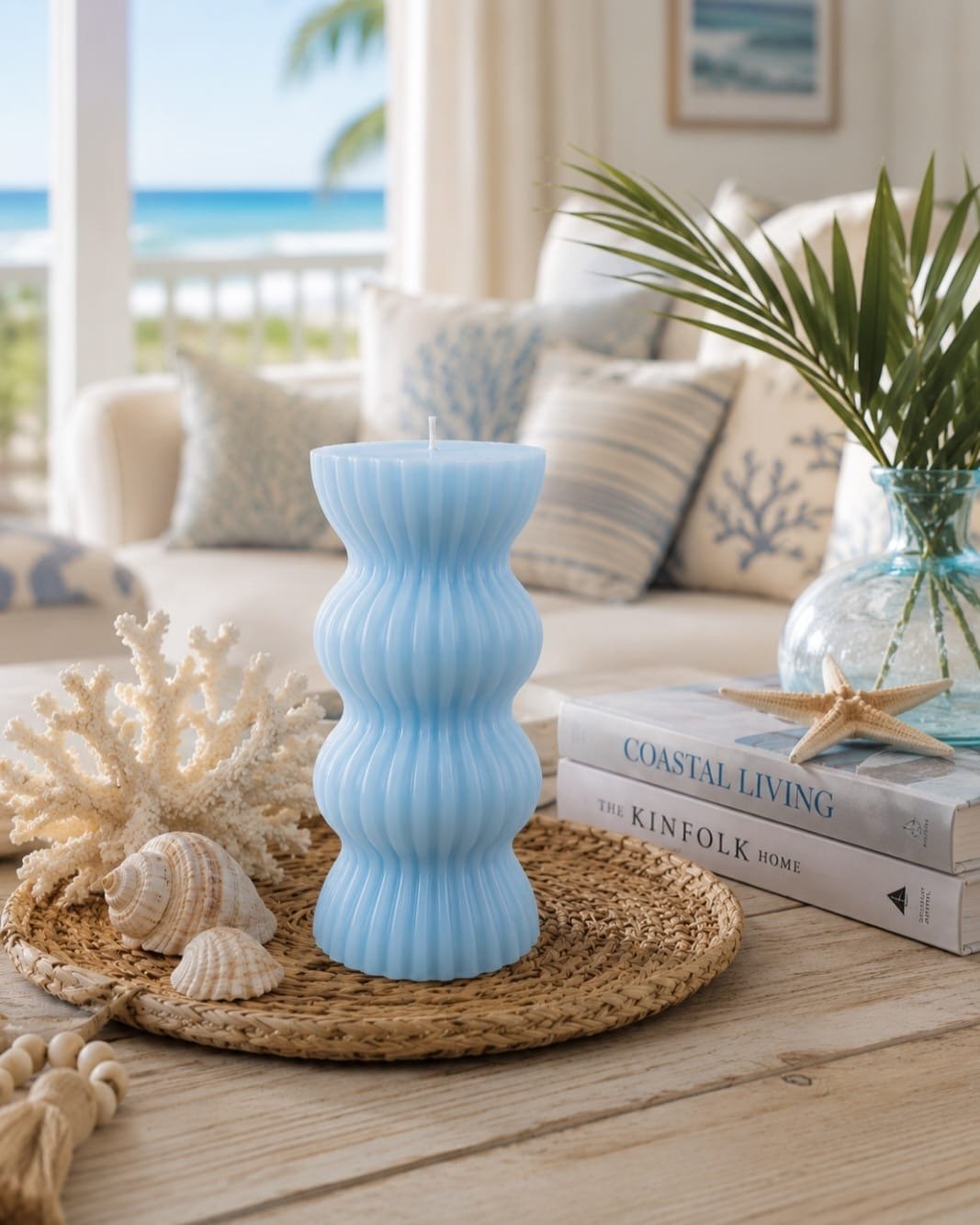 Sky blue sculptural candle with modern ribbed design displayed as a decorative home accent.