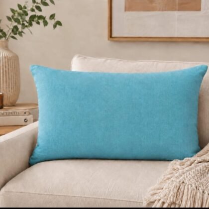 THRO Home 14 × 24 decorative pillow featuring colourful artistic portraits of women in coral, teal, blush, brown, and black.